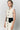Dress — Ecru with black velvet buttons and pockets