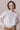 Ecru merino wool sweater with embroidered details