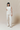 Denim ecru flared pants with circular pocket details