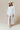 White belted long dress with bell sleeves