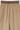 Beige soft wool wide-leg pants with a tailored fit