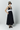 Black cotton poplin summer dress with gathered waist detail